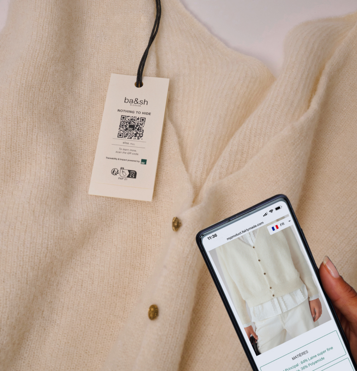 focus on a ba&sh label, person scanning the traceability of the product